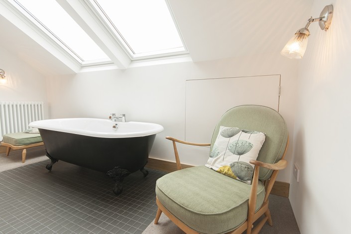 freestanding bath in a loft conversion bathroom, alternative is a wet room shower room for a luxury look in a smaller space