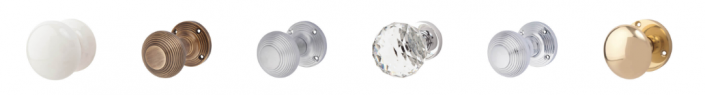 Horizontal image of six different door knobs