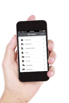 Image of a hand holding a phone showing the menu screen for Co-Construct, a bespoke home builder cloud-based enterprise resource planning software