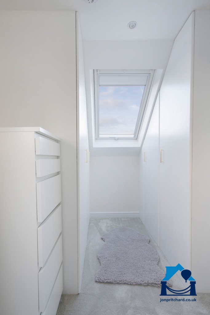 Image showing custom fitted wardrobes in a loft conversion.