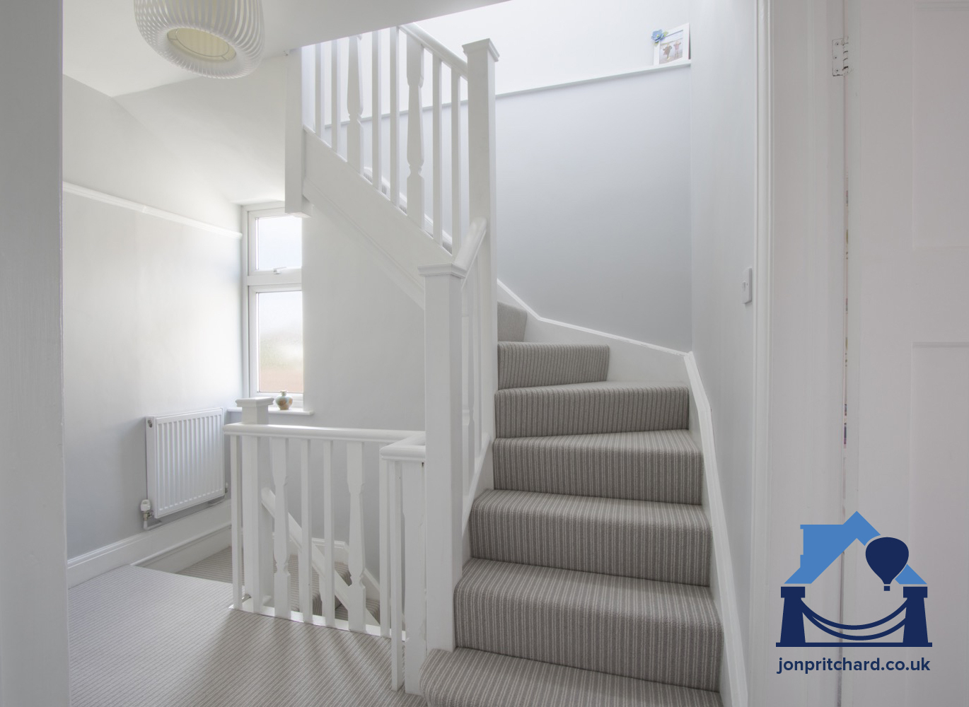 stairs leading up to a bright Jon Pritchard loft conversion in Bristol UK